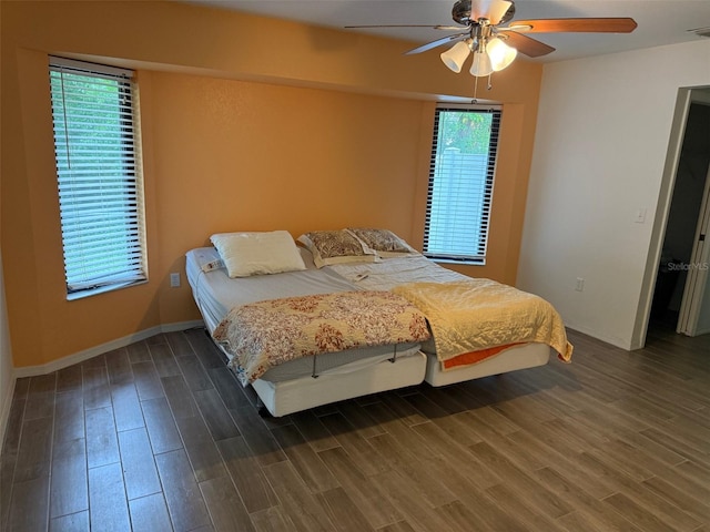 20170 Tralee Dr, Port Charlotte, FL 33952 - bedroom with wood finished floors, baseboards, and a ceiling fan