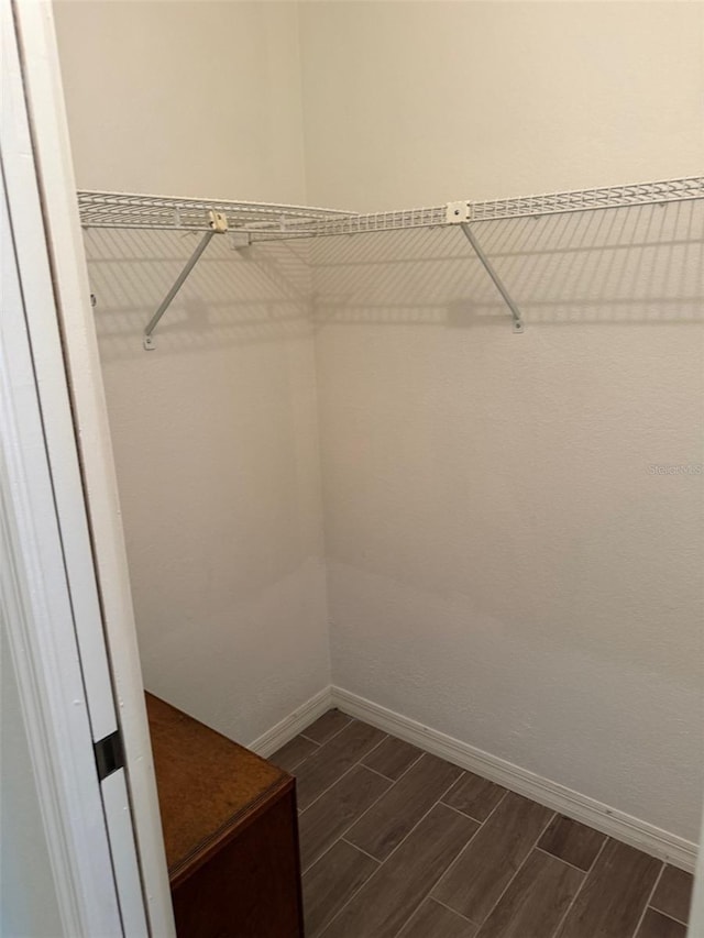 20170 Tralee Dr, Port Charlotte, FL 33952 - spacious closet featuring wood tiled floors