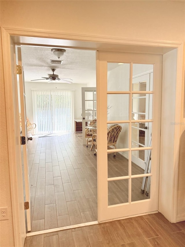 20170 Tralee Dr, Port Charlotte, FL 33952 - doorway to outside with wood finished floors and a ceiling fan