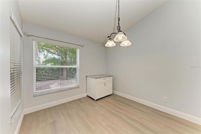 4811 14th Ave E, Bradenton, FL 34208 - unfurnished room with light wood finished floors and baseboards