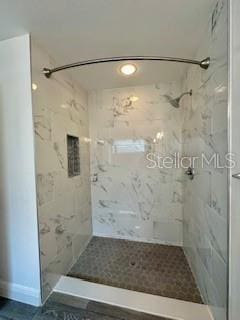 4811 14th Ave E, Bradenton, FL 34208 - full bathroom with a marble finish shower