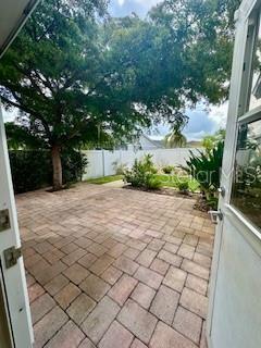 4811 14th Ave E, Bradenton, FL 34208 - fenced backyard with a patio area