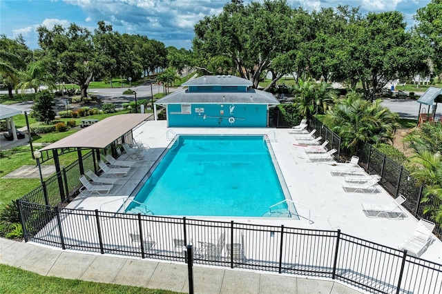 4811 14th Ave E, Bradenton, FL 34208 - community pool featuring view of wooded area and a patio
