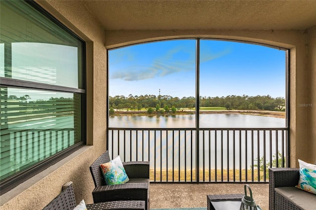 16804 Vardon Ter Unit 307, Bradenton, FL 34211 - sunroom / solarium with a water view and plenty of natural light
