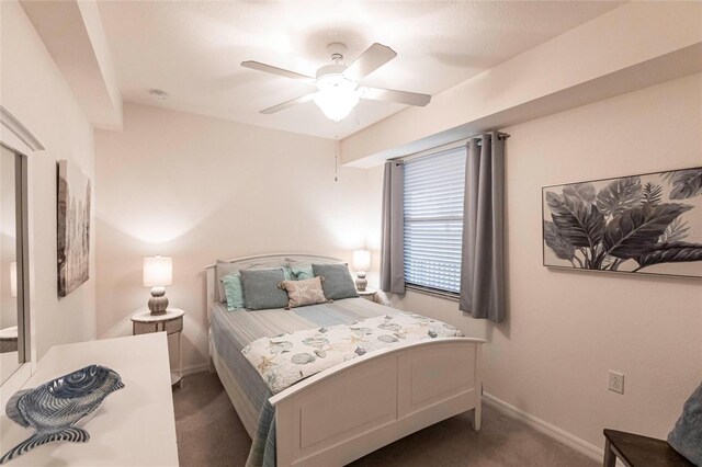16804 Vardon Ter Unit 307, Bradenton, FL 34211 - carpeted bedroom featuring baseboards and a ceiling fan