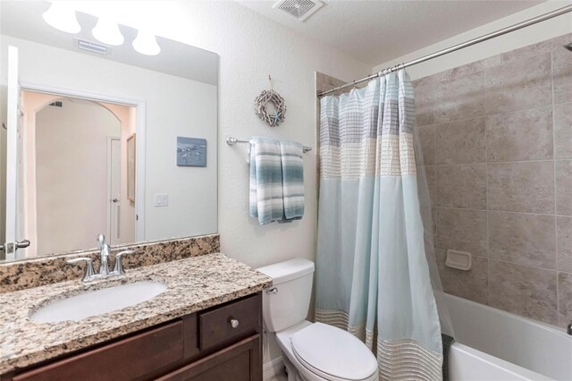 16804 Vardon Ter Unit 307, Bradenton, FL 34211 - bathroom with vanity, toilet, and shower / bath combination with curtain