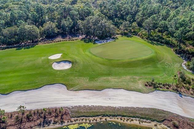 16804 Vardon Ter Unit 307, Bradenton, FL 34211 - drone / aerial view of a golf course