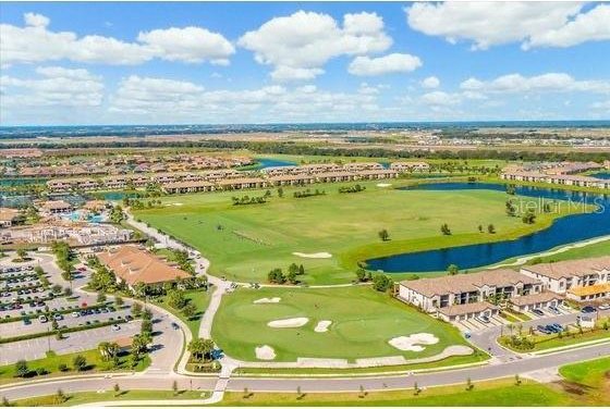 16804 Vardon Ter Unit 307, Bradenton, FL 34211 - aerial view of a nearby body of water and a golf course