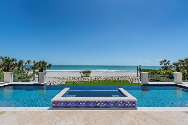 845 Longboat Club Rd, Longboat Key, FL 34228 - view of pool with view of water and beach and a pool with connected hot tub