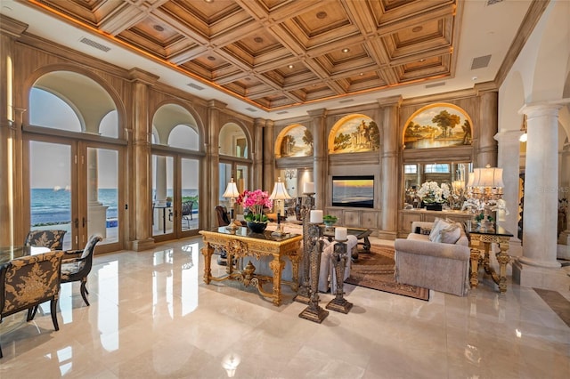 845 Longboat Club Rd, Longboat Key, FL 34228 - building lobby featuring a towering ceiling, ornamental molding, coffered ceiling, and a water view