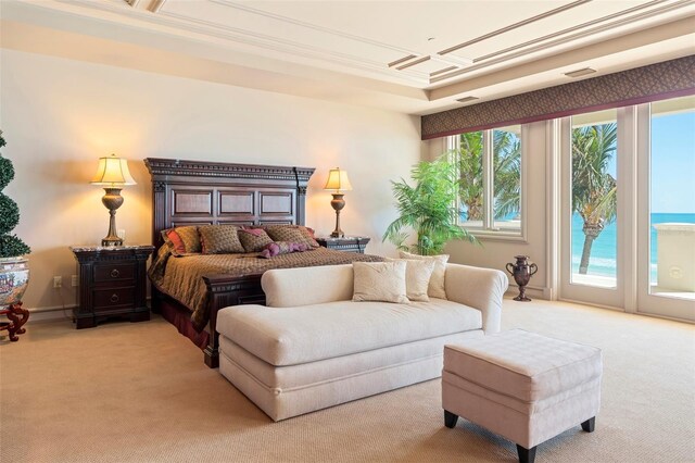 845 Longboat Club Rd, Longboat Key, FL 34228 - bedroom featuring carpet, access to outside, and a raised ceiling