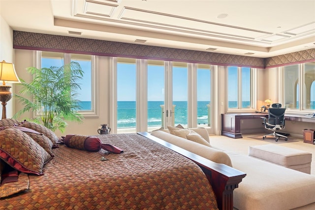 845 Longboat Club Rd, Longboat Key, FL 34228 - carpeted bedroom featuring access to outside, a water view, and multiple windows