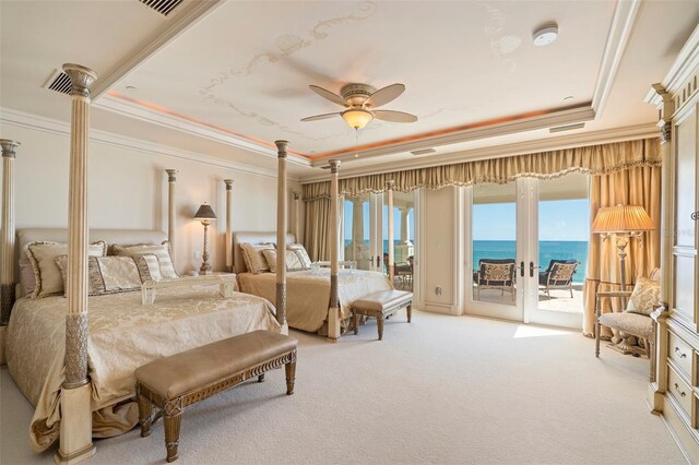 845 Longboat Club Rd, Longboat Key, FL 34228 - bedroom featuring a raised ceiling, light colored carpet, access to outside, and crown molding