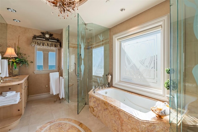 845 Longboat Club Rd, Longboat Key, FL 34228 - bathroom with a stall shower, a whirlpool tub, vanity, tile patterned flooring, and baseboards
