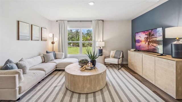 4324 112th St E, Palmetto, FL 34221 - living room featuring light wood finished floors