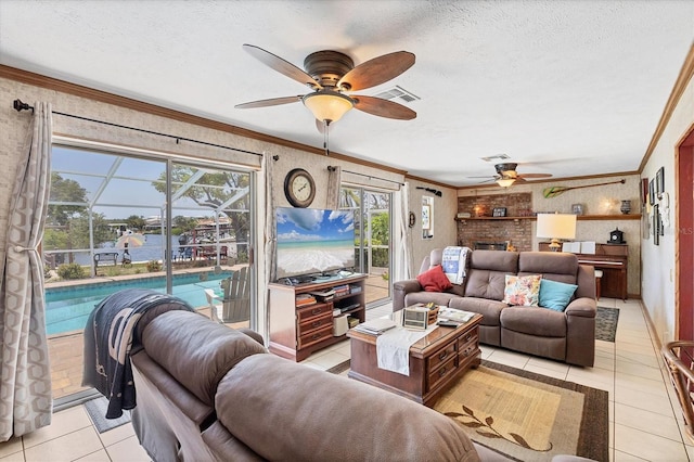 619 Albee Farm Rd N, Nokomis, FL 34275 - living area featuring a ceiling fan, ornamental molding, light tile patterned floors, and a textured ceiling