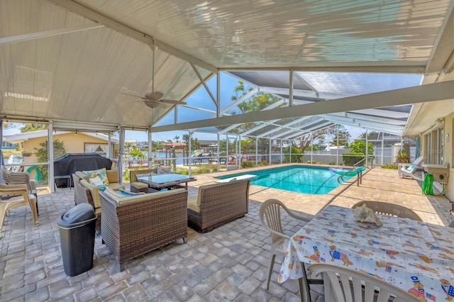 619 Albee Farm Rd N, Nokomis, FL 34275 - view of pool with a patio area, ceiling fan, outdoor lounge area, a lanai, and area for grilling