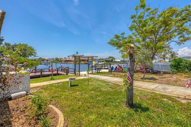 619 Albee Farm Rd N, Nokomis, FL 34275 - view of yard with a boat dock and a water view