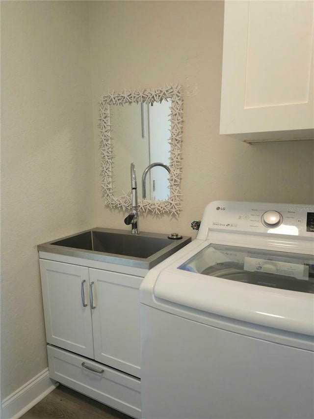 5207 86th Street Ct W, Bradenton, FL 34210 - laundry area featuring washer / clothes dryer and cabinet space