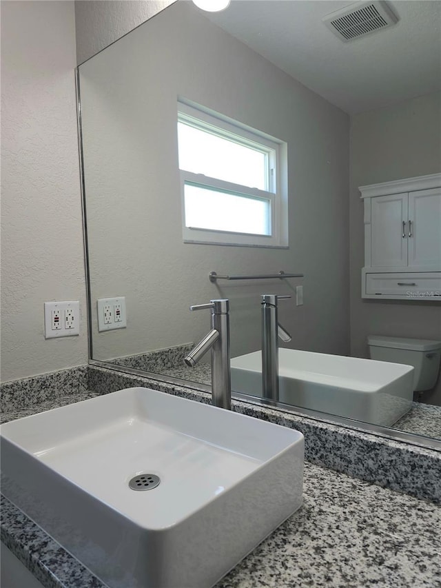 5207 86th Street Ct W, Bradenton, FL 34210 - bathroom with toilet and vanity