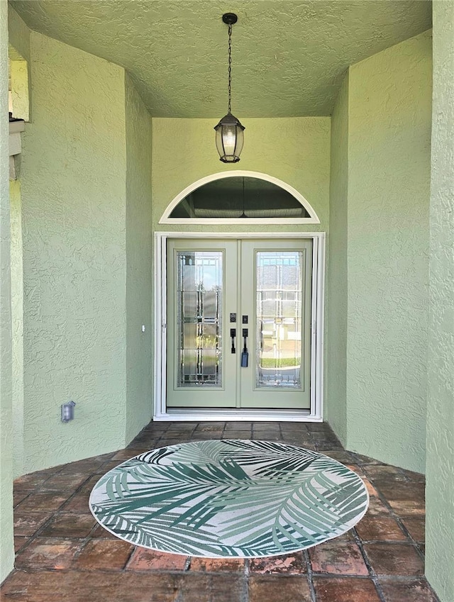 5207 86th Street Ct W, Bradenton, FL 34210 - entrance to property featuring stucco siding and french doors