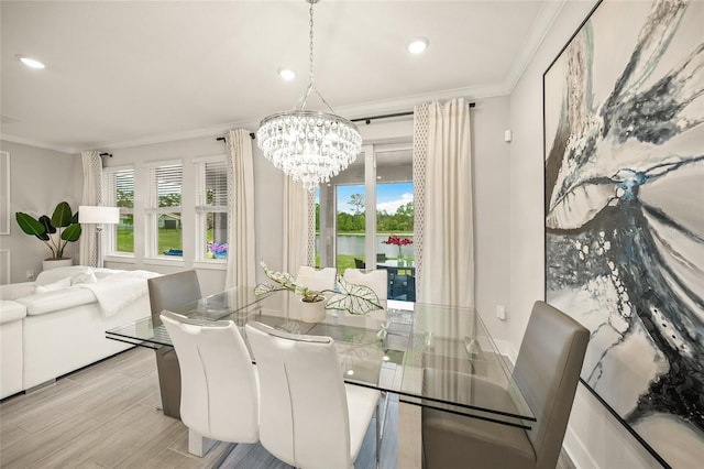 460 Daylily Blvd, Nokomis, FL 34275 - dining space with ornamental molding, a chandelier, a water view, recessed lighting, and light wood-style flooring