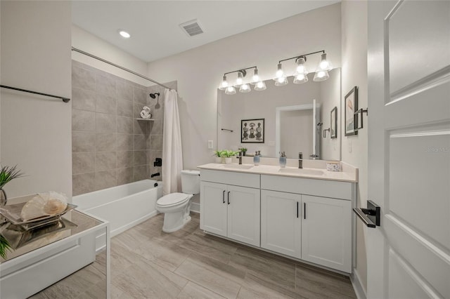 460 Daylily Blvd, Nokomis, FL 34275 - bathroom with toilet, double vanity, shower / bathtub combination with curtain, and recessed lighting