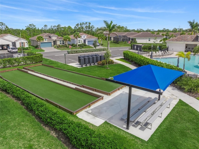 460 Daylily Blvd, Nokomis, FL 34275 - view of property's community featuring a bocce ball area, a residential view, and a lawn