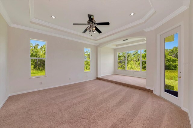 4307 70th Ave E, Ellenton, FL 34222 - carpeted spare room featuring a tray ceiling, crown molding, a ceiling fan, baseboards, and recessed lighting
