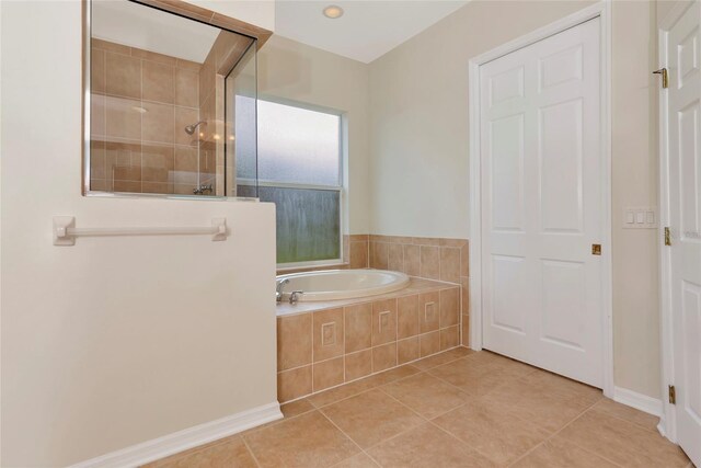 4307 70th Ave E, Ellenton, FL 34222 - full bath with a garden tub, tiled shower, and tile patterned floors