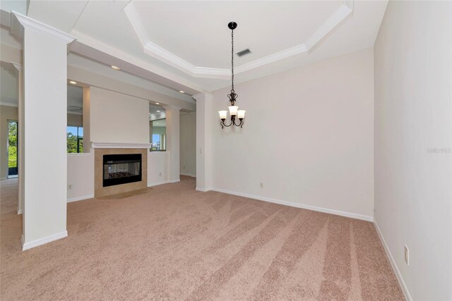4307 70th Ave E, Ellenton, FL 34222 - unfurnished living room with carpet flooring, crown molding, a fireplace, baseboards, and ornate columns