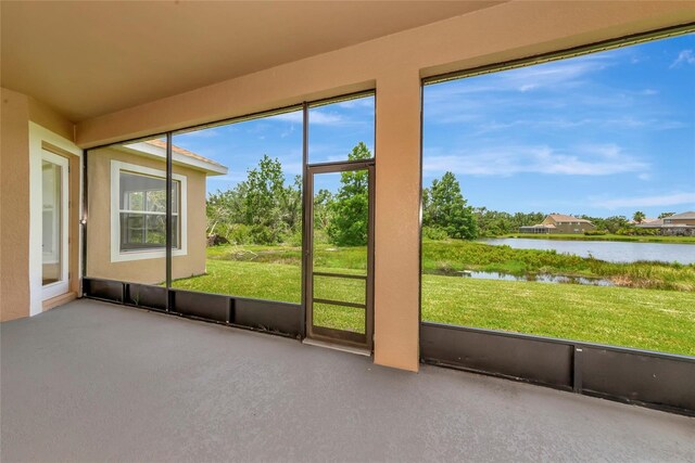 4307 70th Ave E, Ellenton, FL 34222 - unfurnished sunroom featuring a water view and healthy amount of natural light