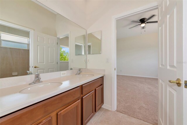 4307 70th Ave E, Ellenton, FL 34222 - full bath with double vanity, a ceiling fan, baseboards, and tile patterned floors