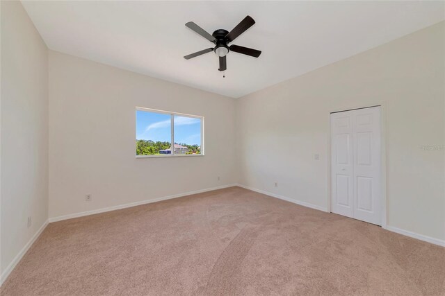 4307 70th Ave E, Ellenton, FL 34222 - empty room with light carpet, a ceiling fan, and baseboards