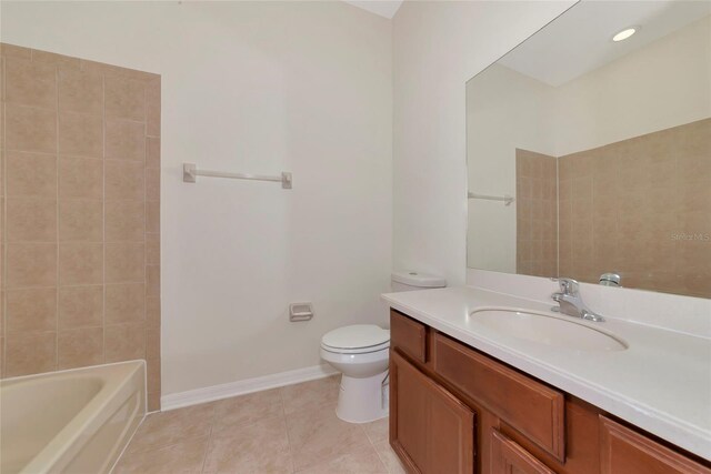 4307 70th Ave E, Ellenton, FL 34222 - bathroom featuring tile patterned flooring, toilet, vanity, baseboards, and shower / bathtub combination