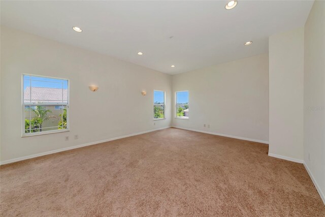 4307 70th Ave E, Ellenton, FL 34222 - carpeted empty room with healthy amount of natural light, recessed lighting, and baseboards