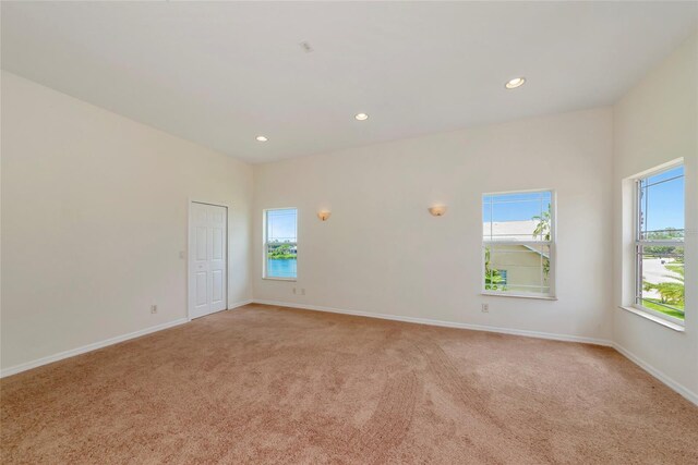 4307 70th Ave E, Ellenton, FL 34222 - spare room with light carpet, recessed lighting, and baseboards