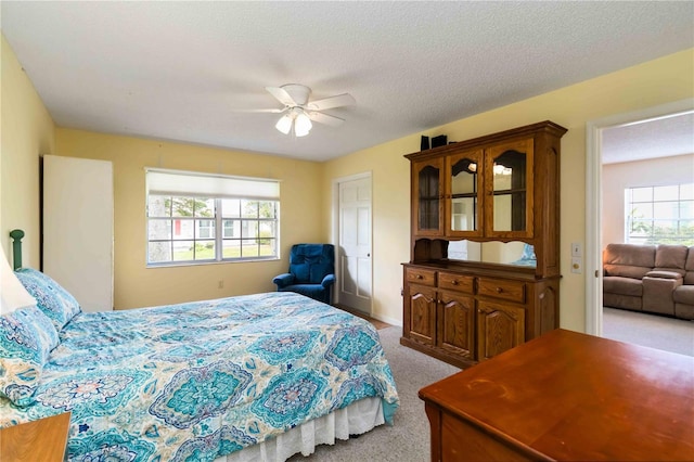 9412 Concord Cir, Bradenton, FL 34210 - bedroom featuring carpet floors and a ceiling fan