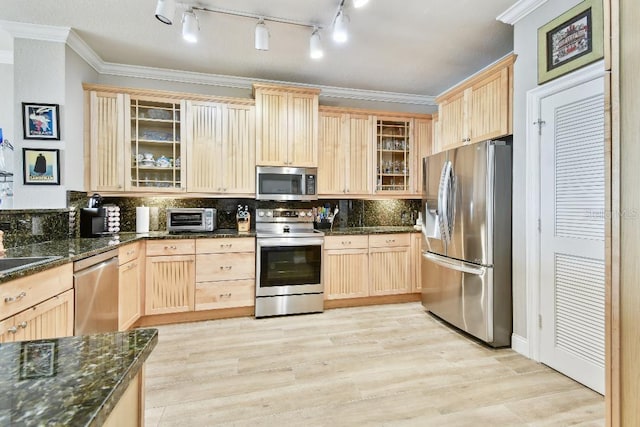 2825 Terra Ceia Bay Blvd Unit 1804, Palmetto, FL 34221 - kitchen with appliances with stainless steel finishes, light brown cabinetry, tasteful backsplash, light wood-style floors, and crown molding