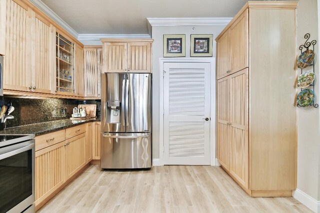 2825 Terra Ceia Bay Blvd Unit 1804, Palmetto, FL 34221 - kitchen featuring stainless steel appliances, light brown cabinets, light wood-style flooring, ornamental molding, and backsplash