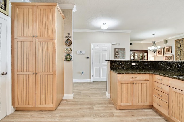 2825 Terra Ceia Bay Blvd Unit 1804, Palmetto, FL 34221 - kitchen with light brown cabinetry, ornamental molding, light wood-style flooring, a chandelier, and pendant lighting