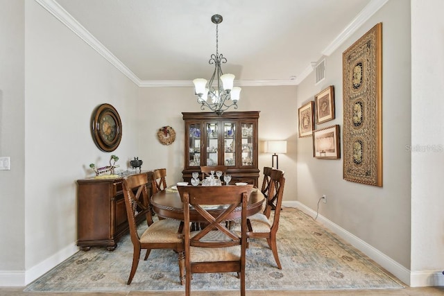 2825 Terra Ceia Bay Blvd Unit 1804, Palmetto, FL 34221 - dining room with a chandelier and crown molding