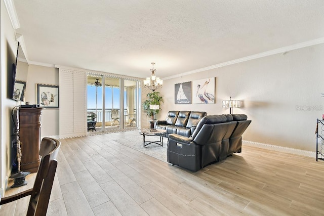 2825 Terra Ceia Bay Blvd Unit 1804, Palmetto, FL 34221 - living area with light wood-style floors, ornamental molding, a chandelier, and a textured ceiling