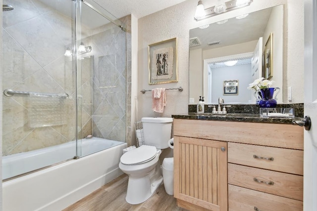 2825 Terra Ceia Bay Blvd Unit 1804, Palmetto, FL 34221 - bathroom with vanity, wood finished floors, and combined bath / shower with glass door