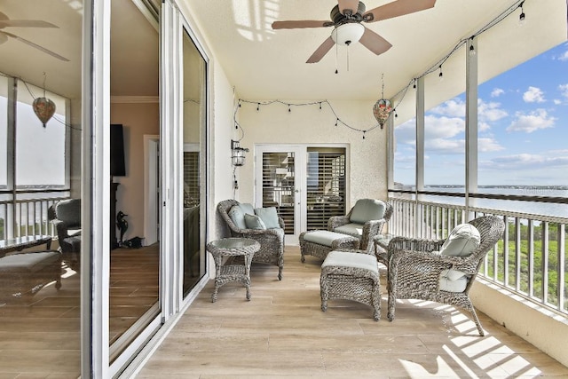 2825 Terra Ceia Bay Blvd Unit 1804, Palmetto, FL 34221 - sunroom with ceiling fan and a water view