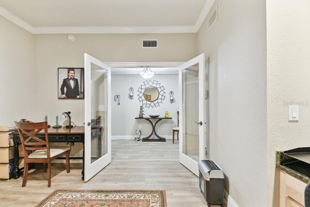 2825 Terra Ceia Bay Blvd Unit 1804, Palmetto, FL 34221 - corridor featuring french doors, crown molding, and light wood-type flooring