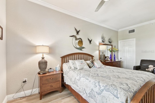 2825 Terra Ceia Bay Blvd Unit 1804, Palmetto, FL 34221 - bedroom featuring light wood finished floors, crown molding, and ceiling fan