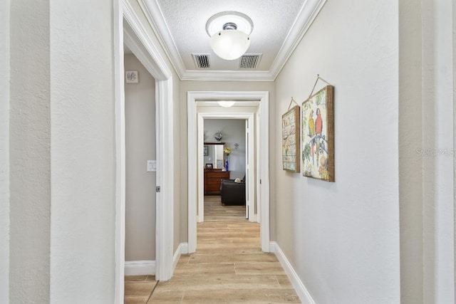 2825 Terra Ceia Bay Blvd Unit 1804, Palmetto, FL 34221 - corridor with light wood finished floors, ornamental molding, and a textured ceiling