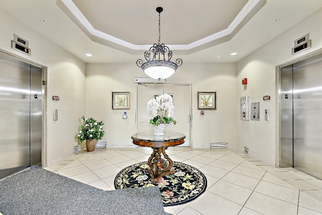 2825 Terra Ceia Bay Blvd Unit 1804, Palmetto, FL 34221 - hallway with elevator, a raised ceiling, tile patterned floors, and recessed lighting