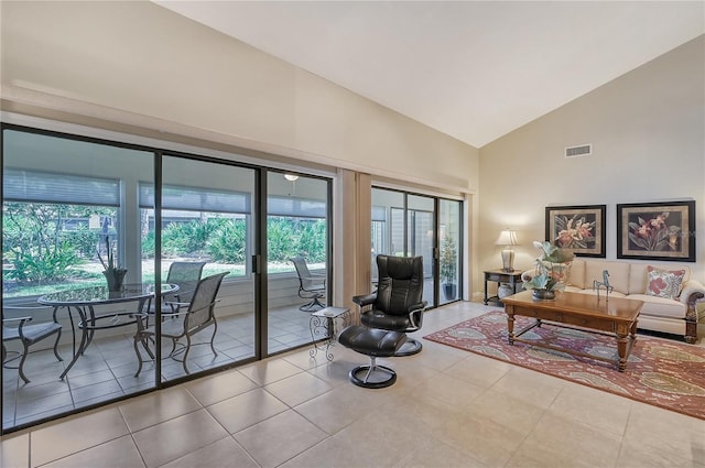 4555 Chandlers Forde Unit 47, Sarasota, FL 34235 - tiled living area with high vaulted ceiling